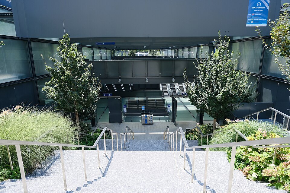 Planted steps leading down to the entrance of Champel station on the Léman Express