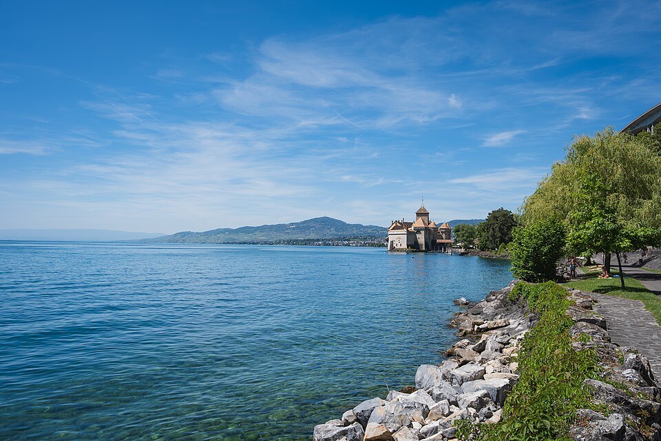 The shore of the lake at Veytaux, Chillon Castle in the distance