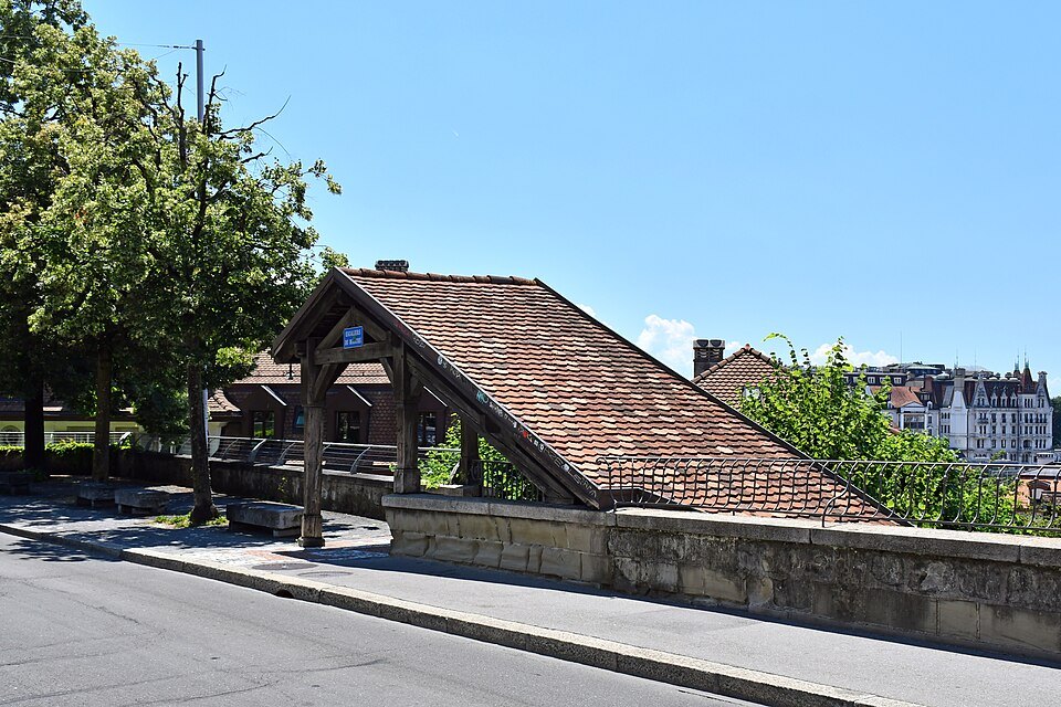 The covered wooden Escaliers du Marché climbing through Lausanne's old town