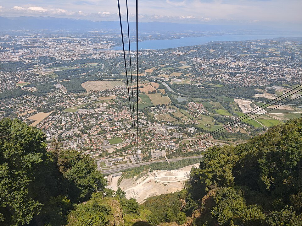 The view down the cable car line from the top of the Salève over the plain