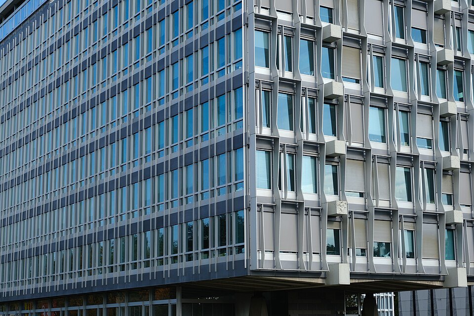 The gridded glass facade of the World Health Organization's main building