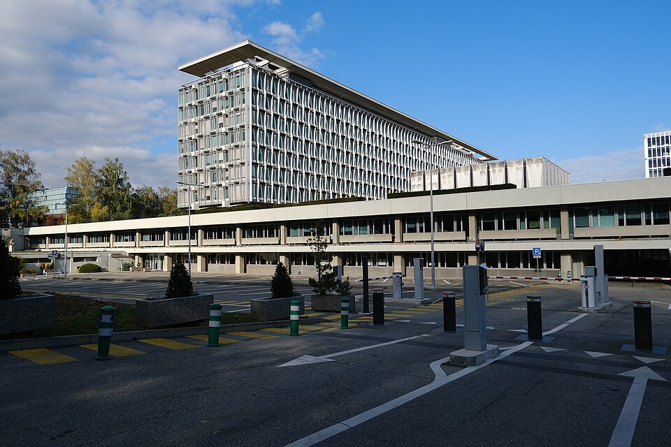 The long main building of the World Health Organization above its forecourt