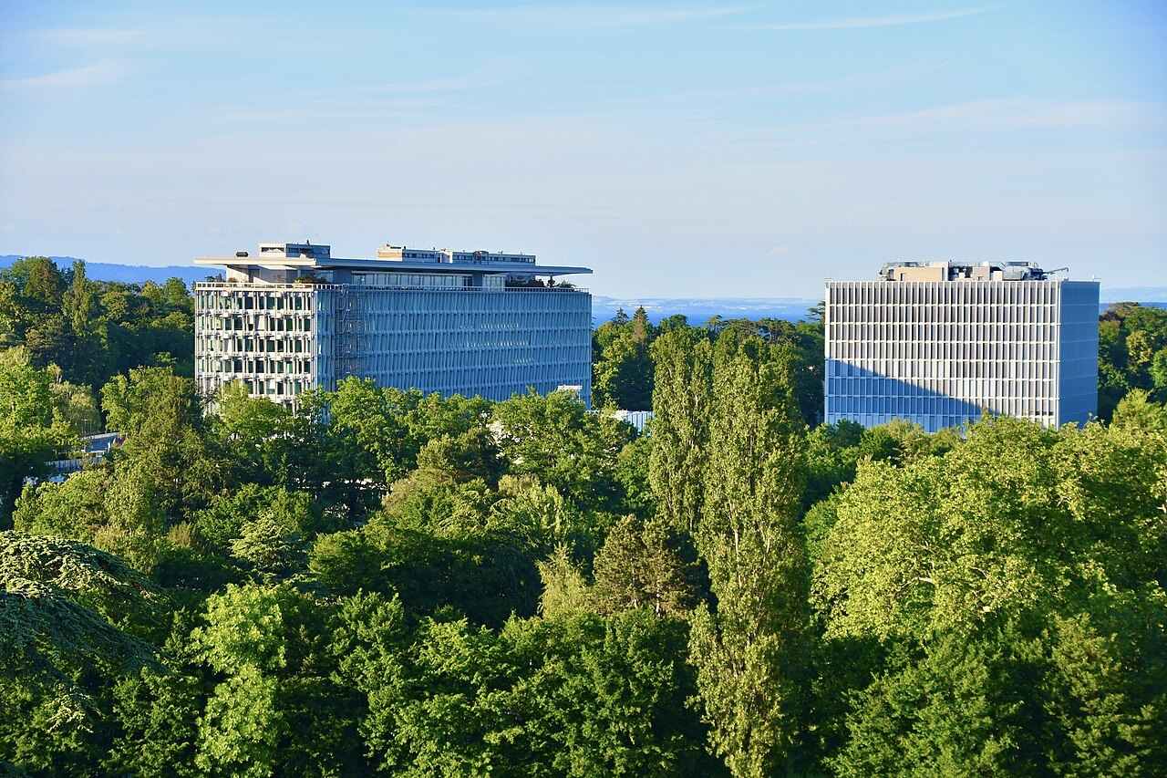 The World Health Organization's buildings rising above the trees of Pregny-Chambésy