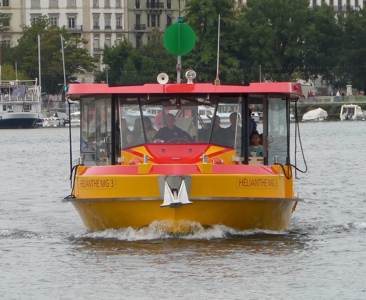 The solar ferry Hélianthe heading across the harbor