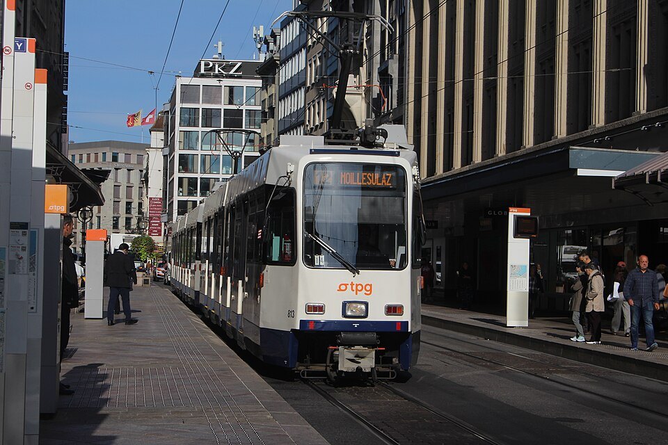 An older tram on line 12 at a city stop