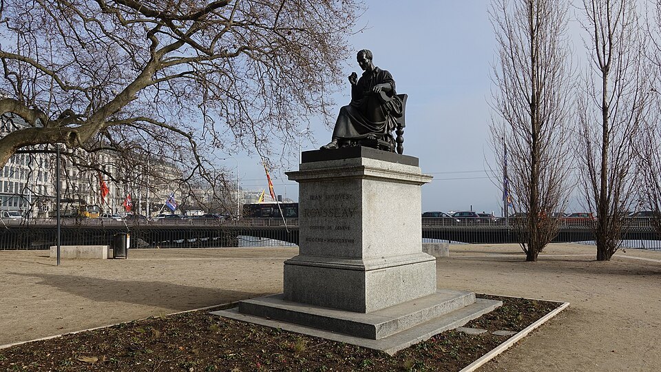 Rousseau's statue on the open gravel of the island in winter