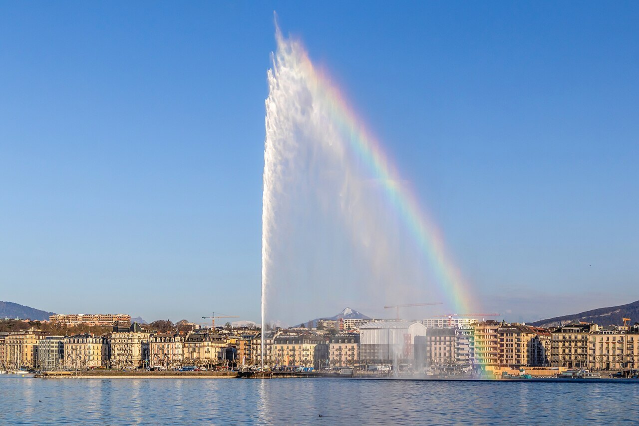 A rainbow in the spray of the Jet d'Eau above the harbor