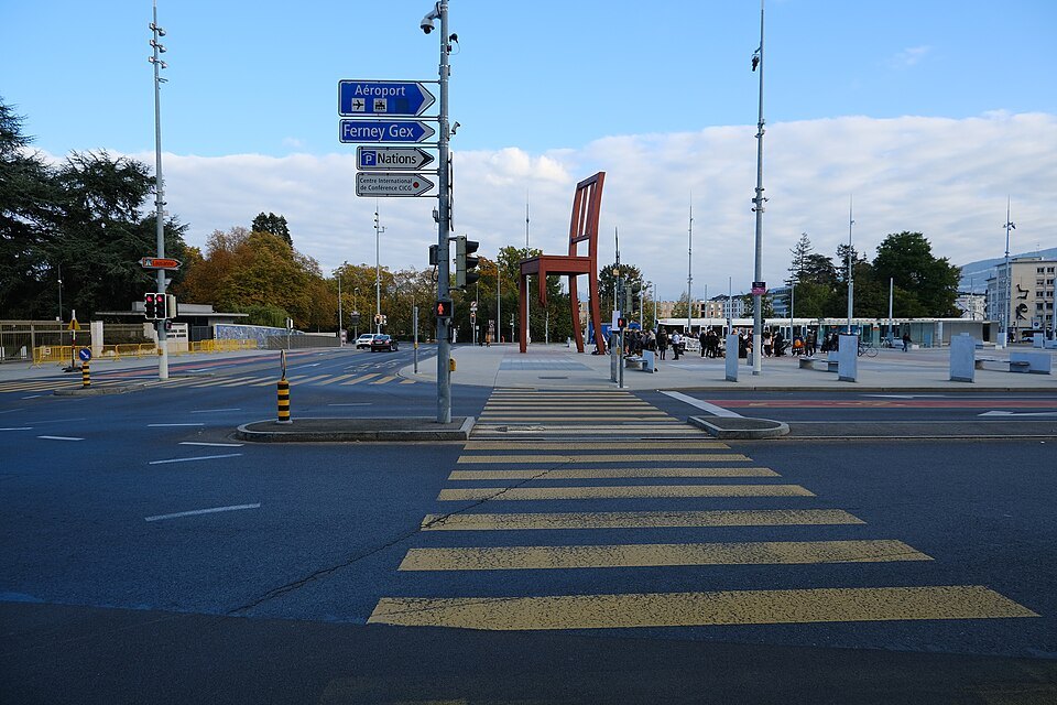 The crossing on the Place des Nations, the Broken Chair beyond