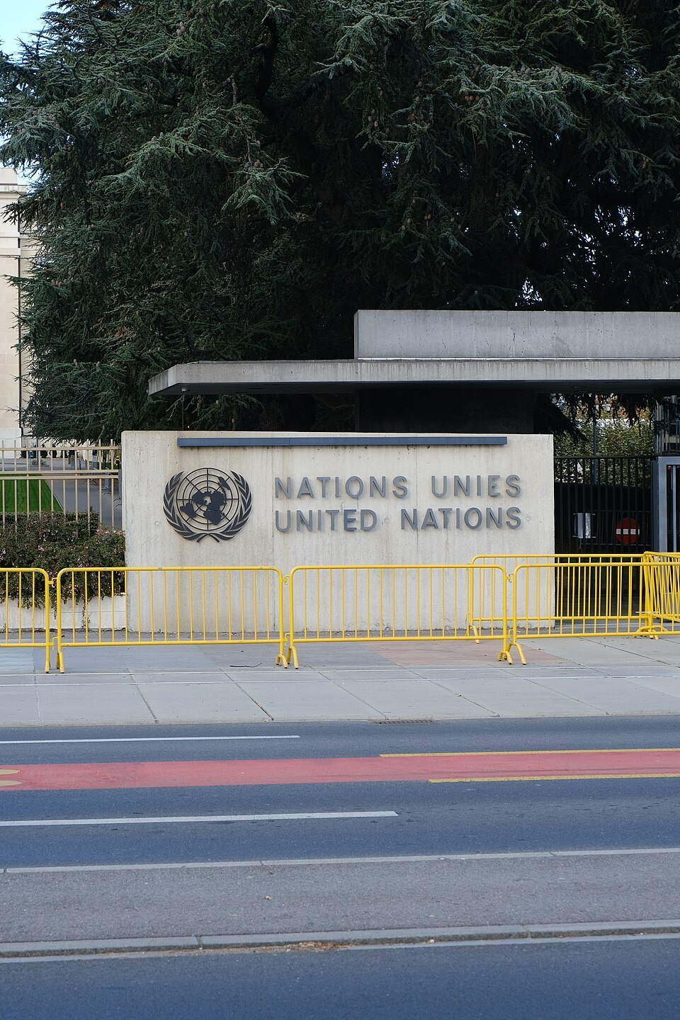 The Nations Unies sign at a gate of the Palace of Nations grounds