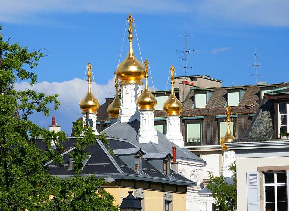 The gilded onion domes of the Russian Church rising above the neighboring roofs